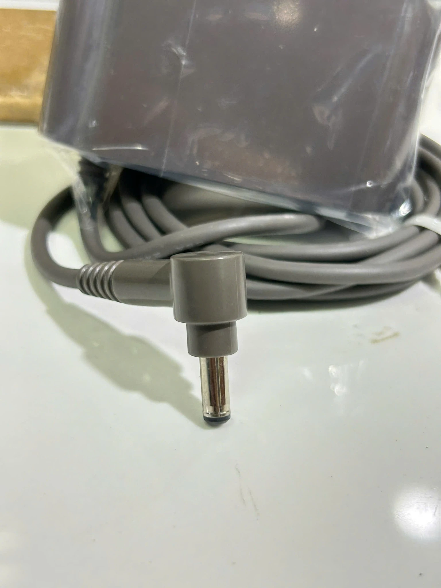 z7870645361804_ce9d00671480947c575e85c87f9ad543-Photoroom Cục sạc chính hãng cho máy hút bụi Dyson V12, V12 Detect Slim, V12s Submarine. Long Thịnh Tech Dyson
